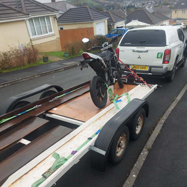 broken down motorbike on trailer