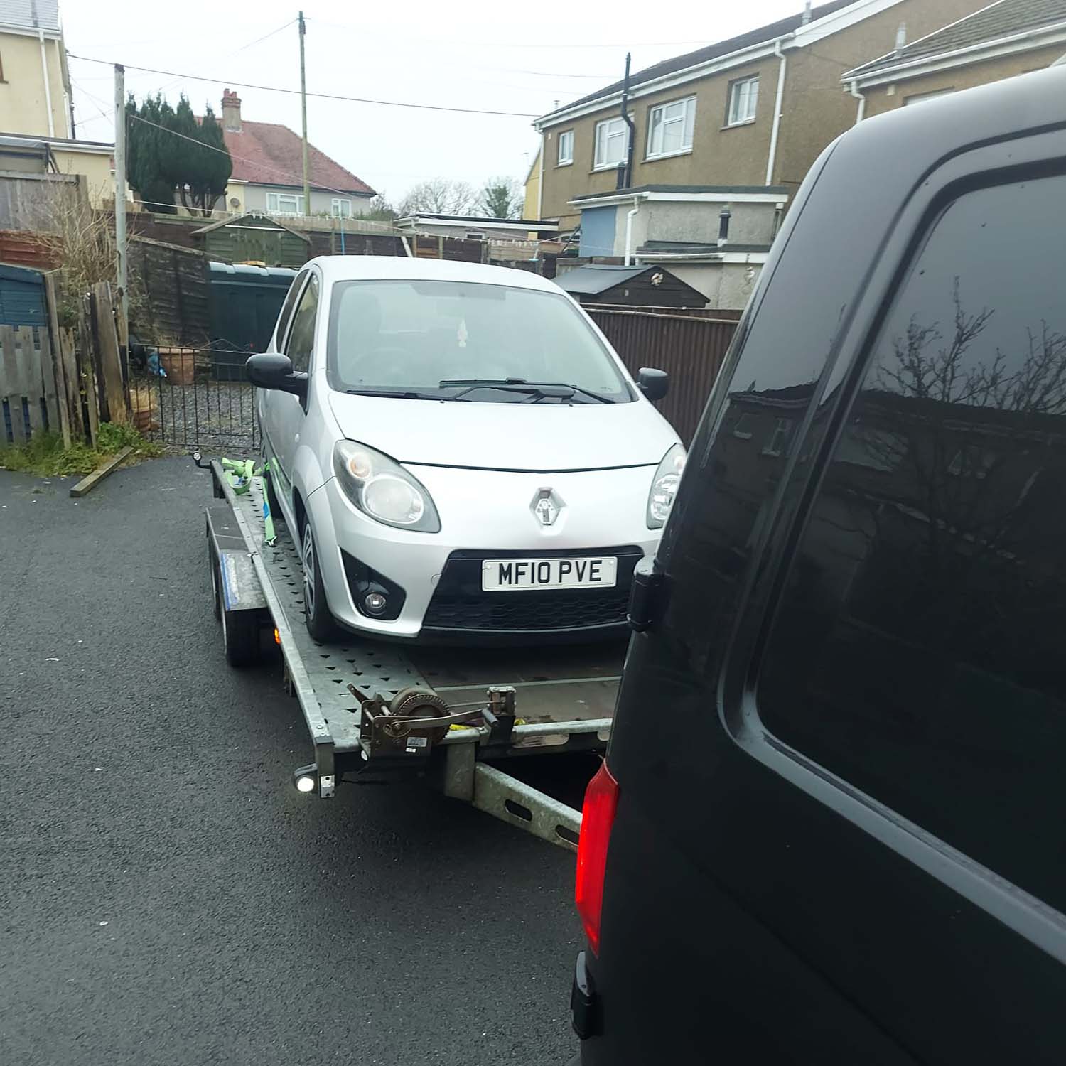 Broken down Renault car on trailer